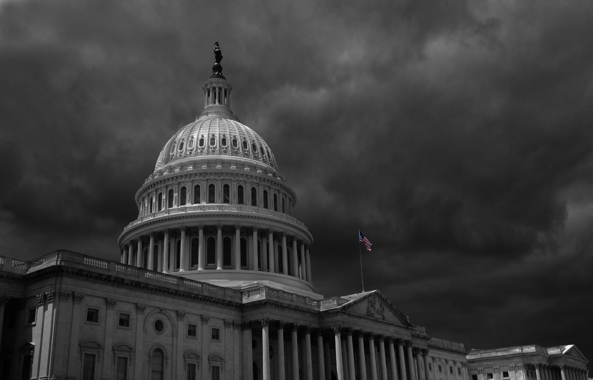 Black and white image of clouds over U.S. Capitol building