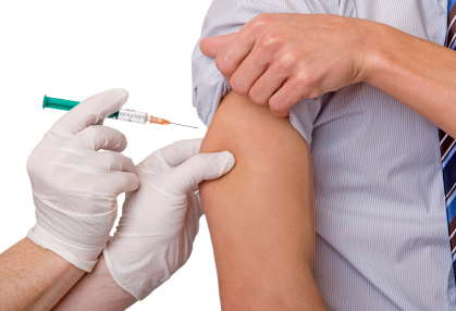 Flu vaccine injection in man's arm