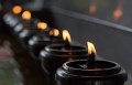 Row of prayer candles in a temple