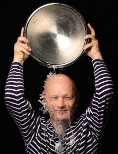 man pouring water on his head