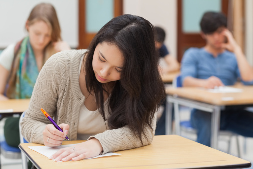 Young woman taking an exam